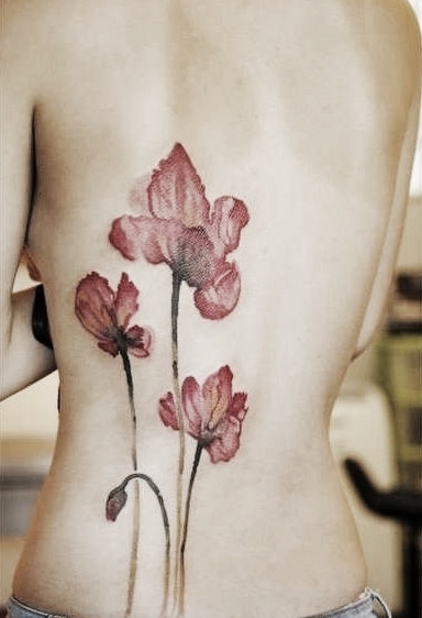 背后花朵纹身图片