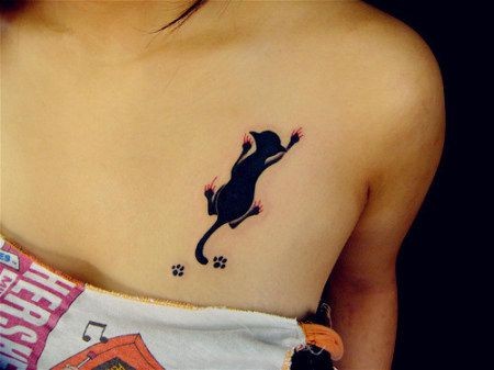 酷酷的小黑猫纹身图片