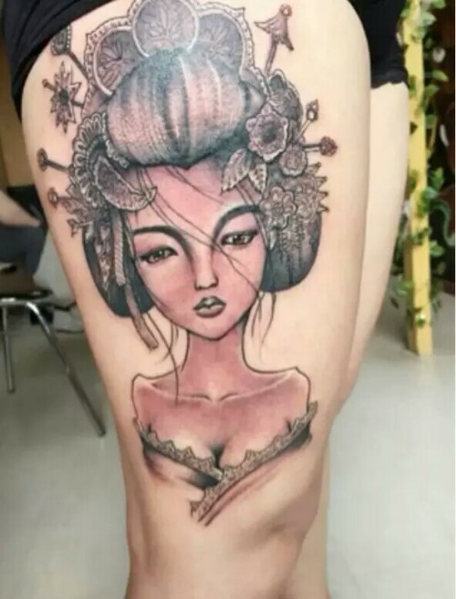 美女个性艺妓腿部纹身图片